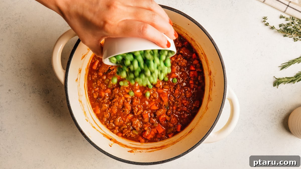 Classic Shepherd's Pie with Ground Beef or Lamb 10 Stirring frozen peas into the finished gravy off the heat.