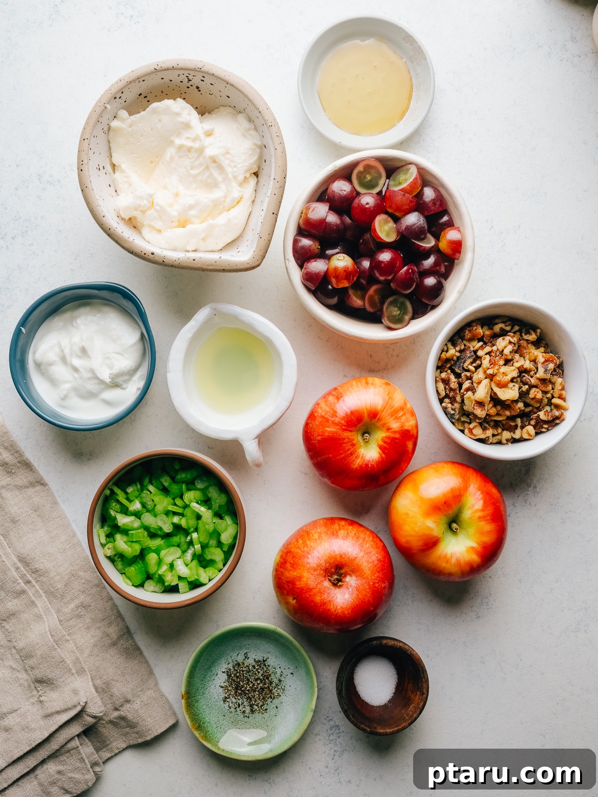 Classic Waldorf Salad with Apples, Grapes, and Walnuts 3 Ingredients for classic creamy apple salad: apples, celery, red grapes, walnuts, mayonnaise, Greek yogurt, honey and lemon juice.