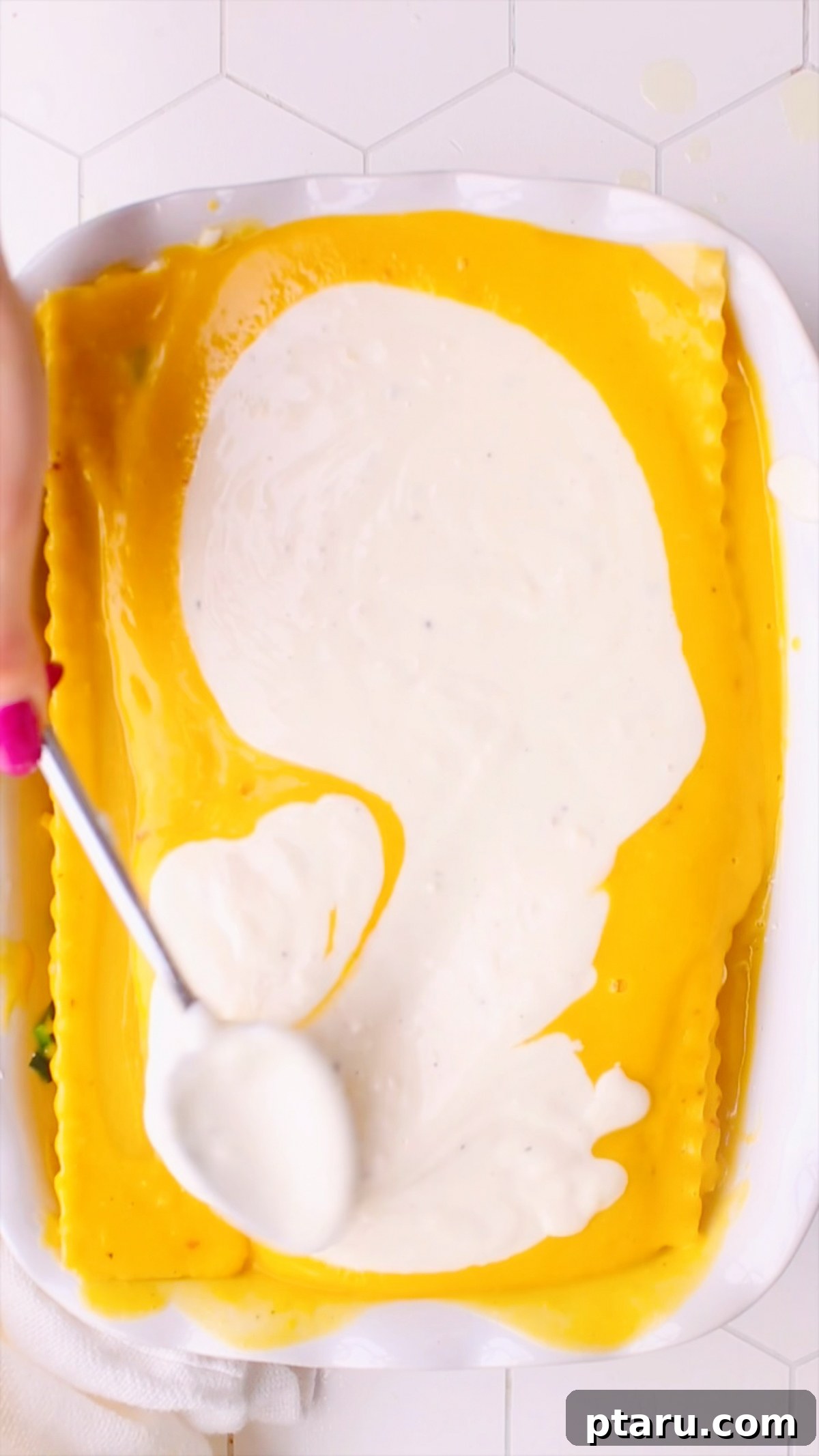 Butternut Squash Lasagna with Creamy Béchamel 14 Béchamel sauce spread over the final layer of noodles.