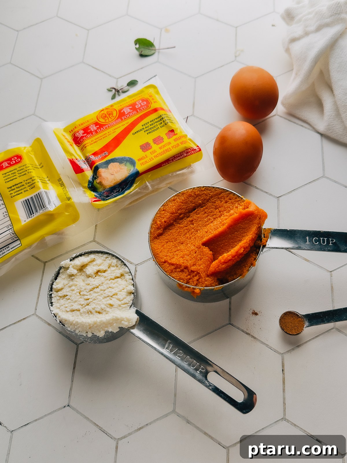 Homemade Pumpkin Ravioli Made with Wonton Wrappers 3 Pumpkin ravioli ingredients including wonton wrappers, eggs, canned pumpkin puree, ricotta, Parmesan and spices.